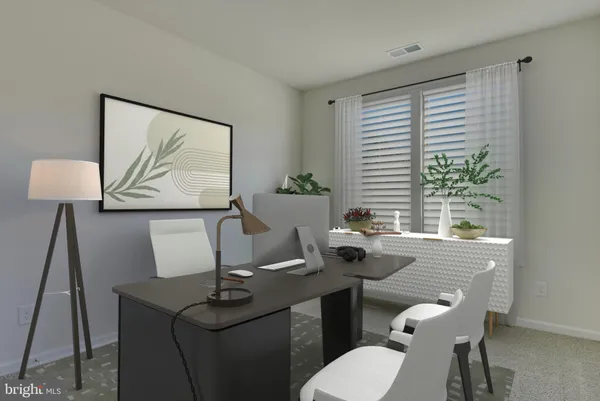 a bedroom with a bed and furniture