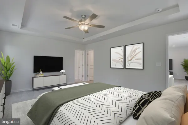 a bathroom with a granite countertop sink a vanity and a large mirror