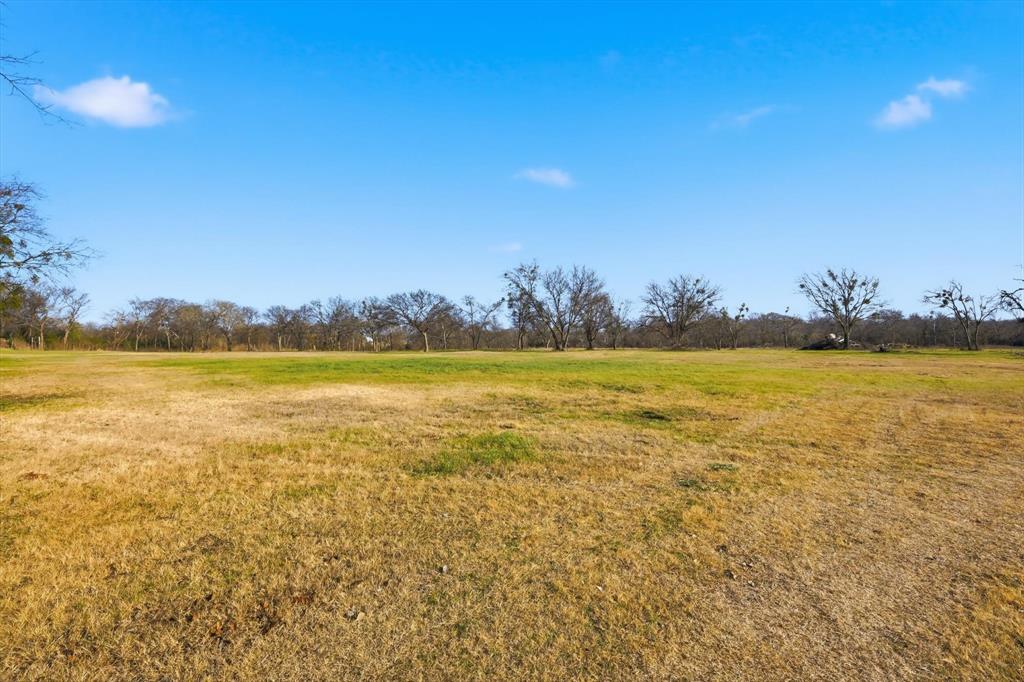 1401 South Walnut Street Cleburne, TX 76033 - Photo 14 of 23 a view of an ocean and beach