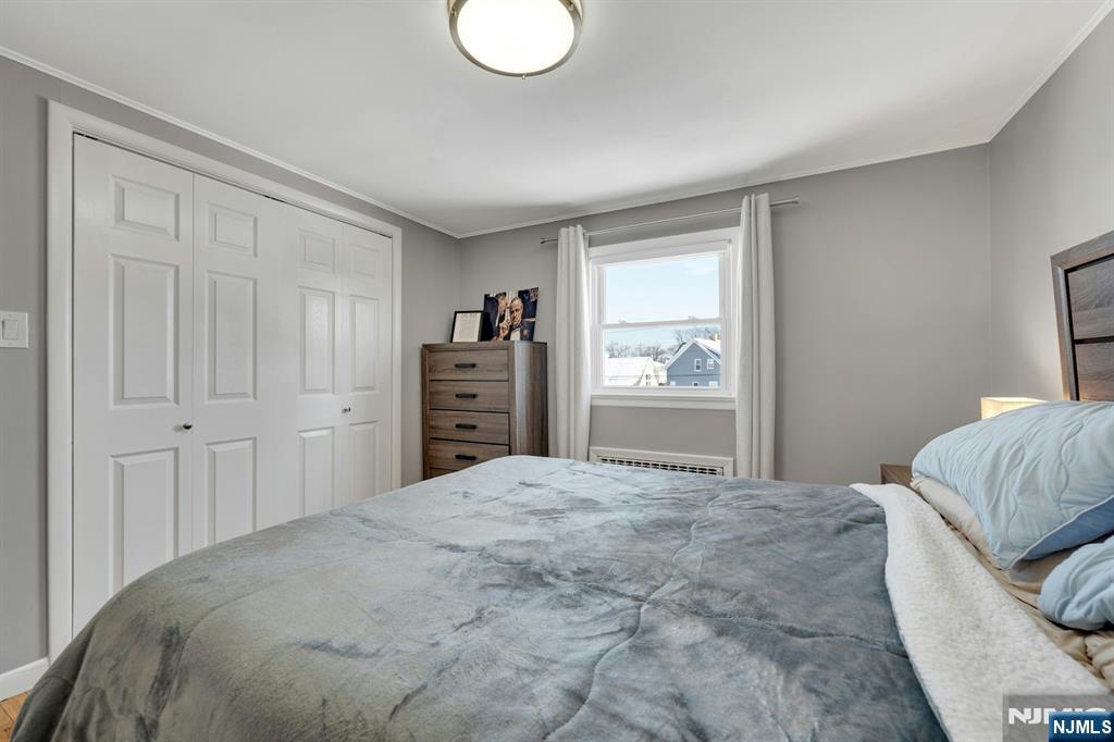 61 Christina Street, Unit 2 Little Ferry, NJ 07643 - Photo 14 of 18 a bedroom with a bed and a window