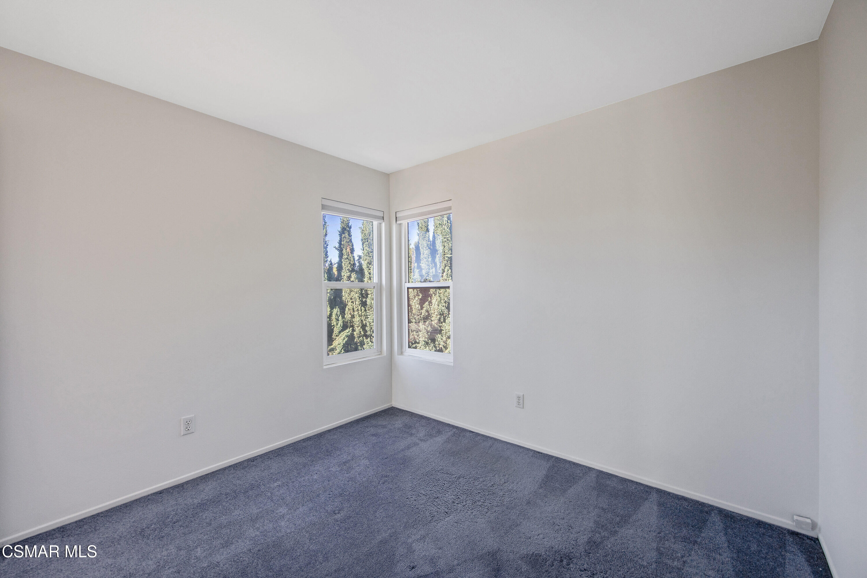 11833 Nightingale Street Moorpark, CA 93021 - Photo 20 of 46 an empty room with windows