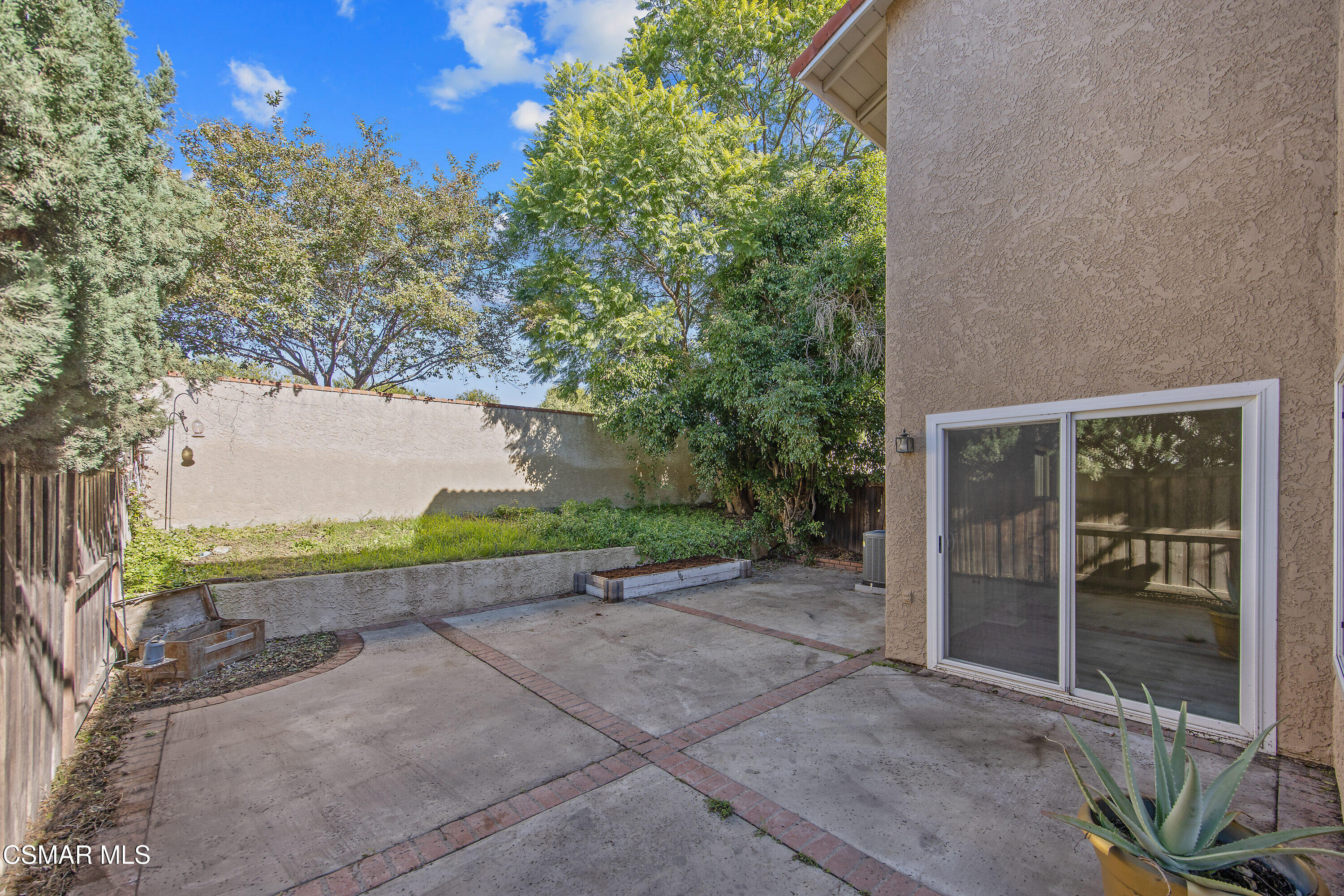 11833 Nightingale Street Moorpark, CA 93021 - Photo 33 of 46 a view of a street with a house in the background