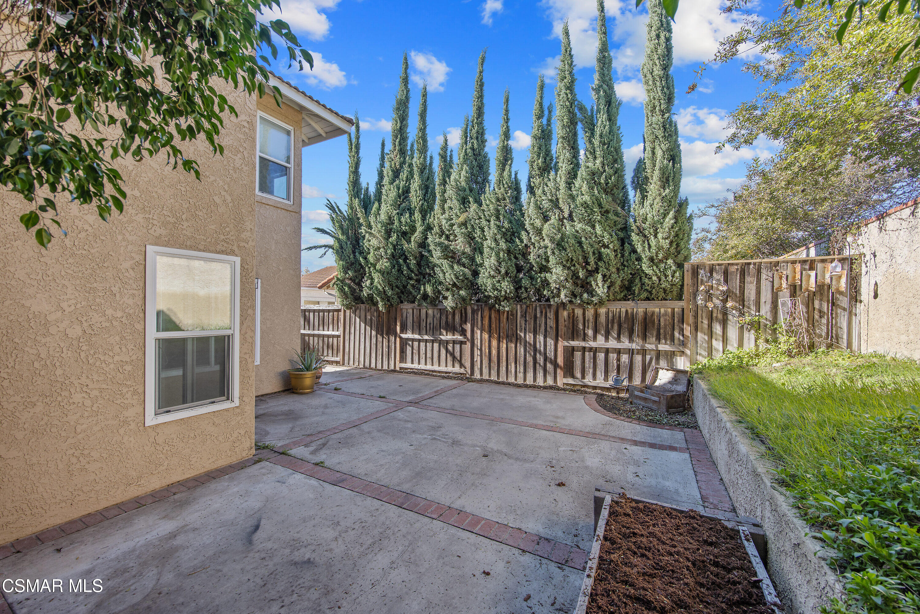 11833 Nightingale Street Moorpark, CA 93021 - Photo 36 of 46 a view of a backyard with pathway