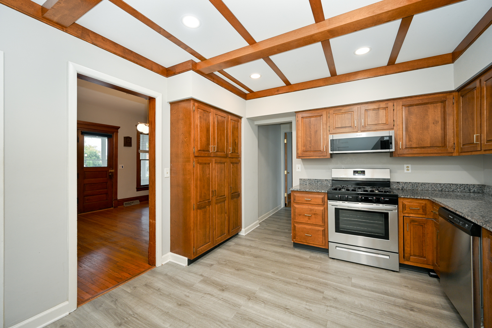 24021 Chicago Street Plainfield, IL 60544 - Photo 14 of 41 a kitchen with stainless steel appliances granite countertop a stove and a refrigerator