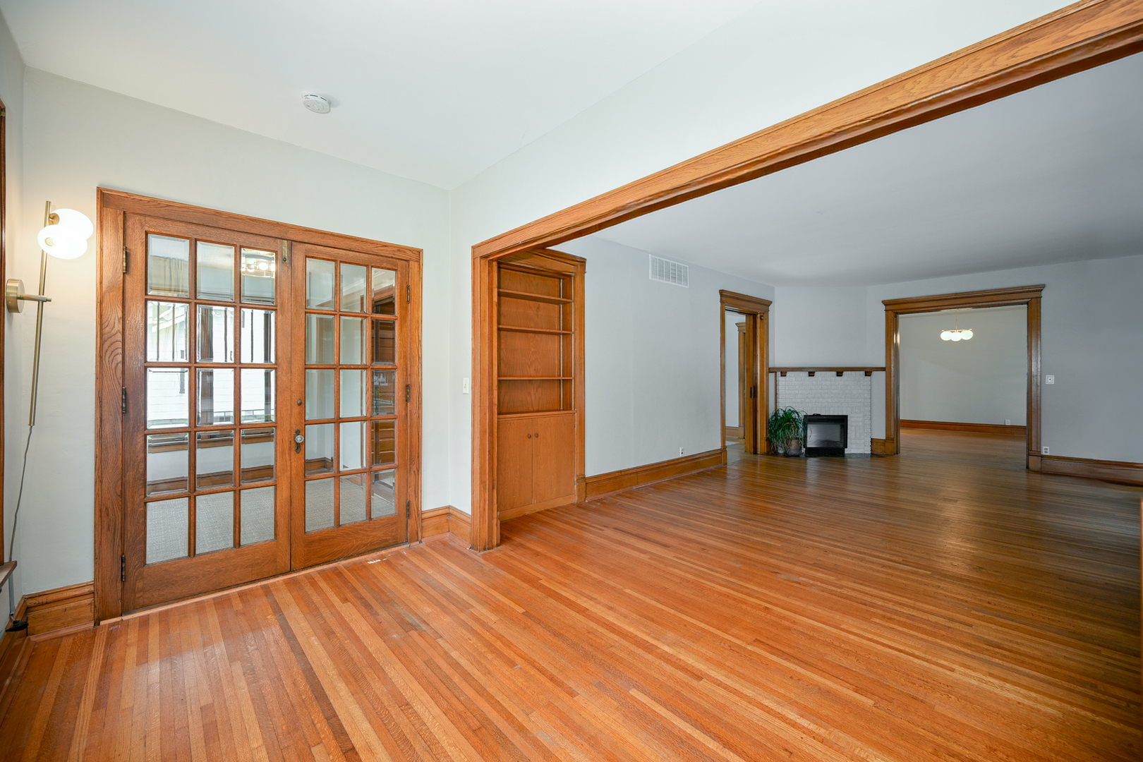 24021 Chicago Street Plainfield, IL 60544 - Photo 18 of 41 wooden floor in an empty room with a window