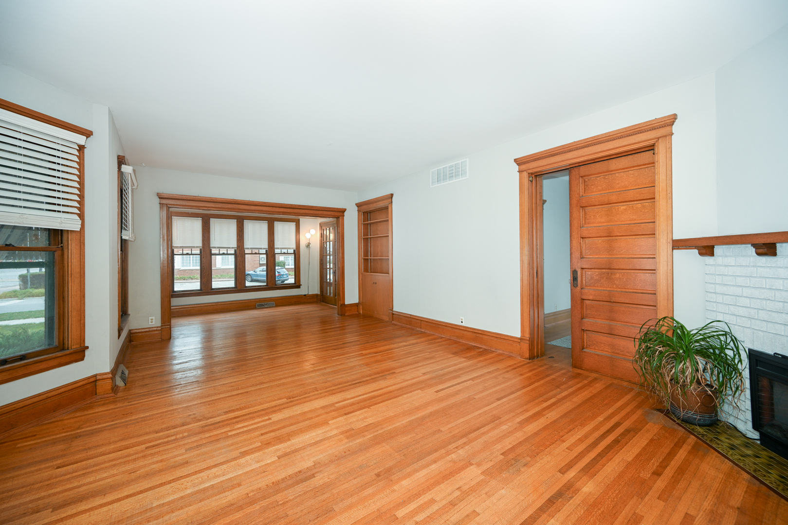 24021 Chicago Street Plainfield, IL 60544 - Photo 20 of 41 wooden floor in an empty room with a window