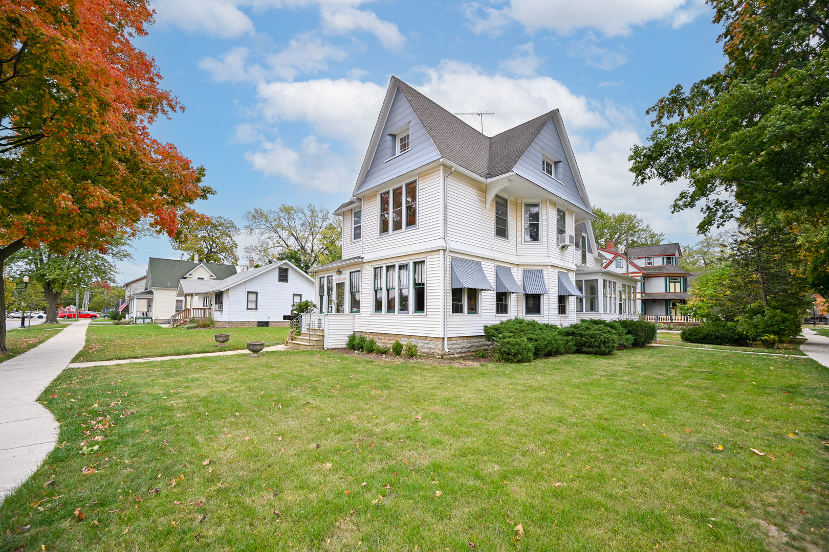 24021 Chicago Street Plainfield, IL 60544 - Photo 2 of 41 a view of a house with a yard table and chairs