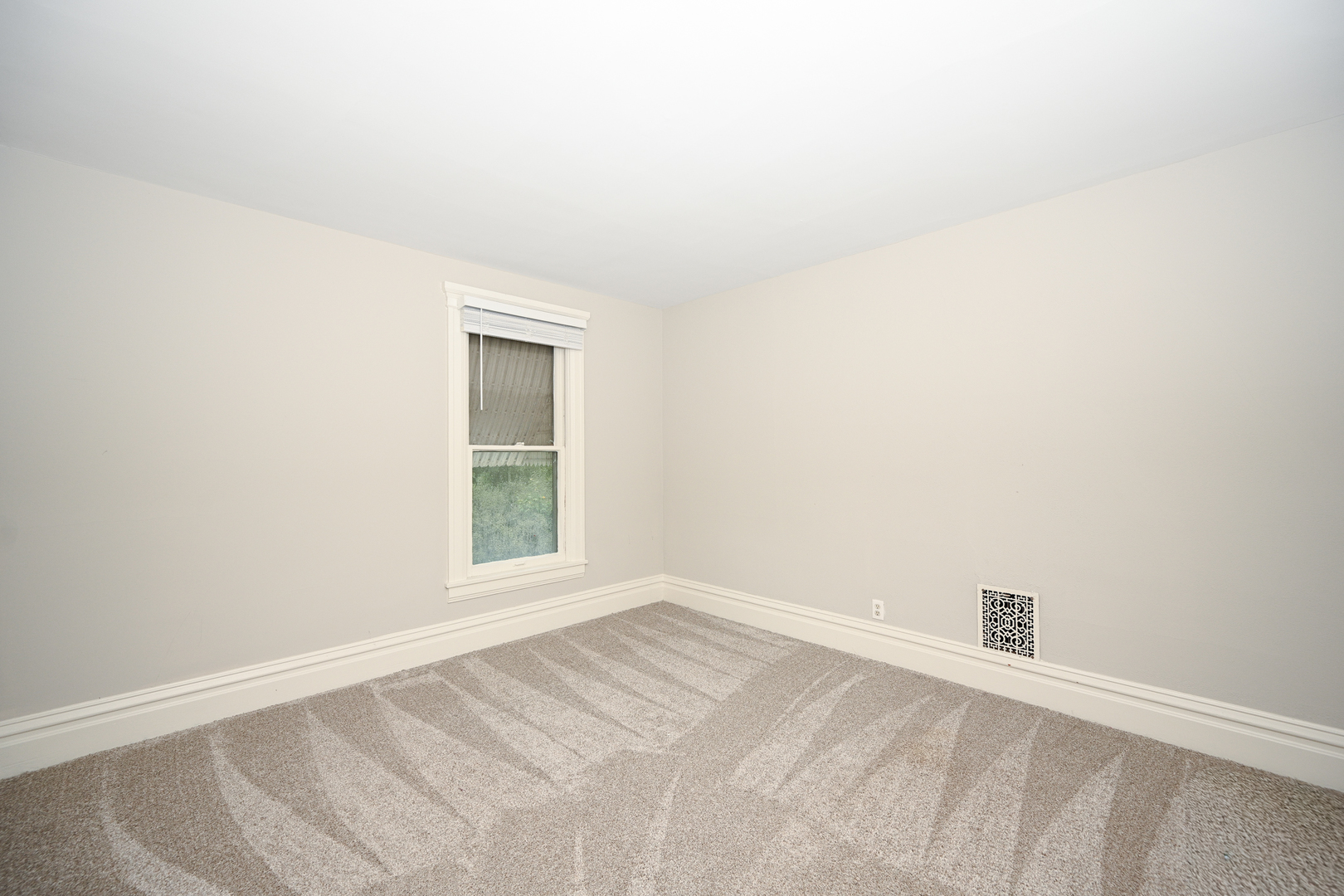 24021 Chicago Street Plainfield, IL 60544 - Photo 22 of 41 an empty room with a window
