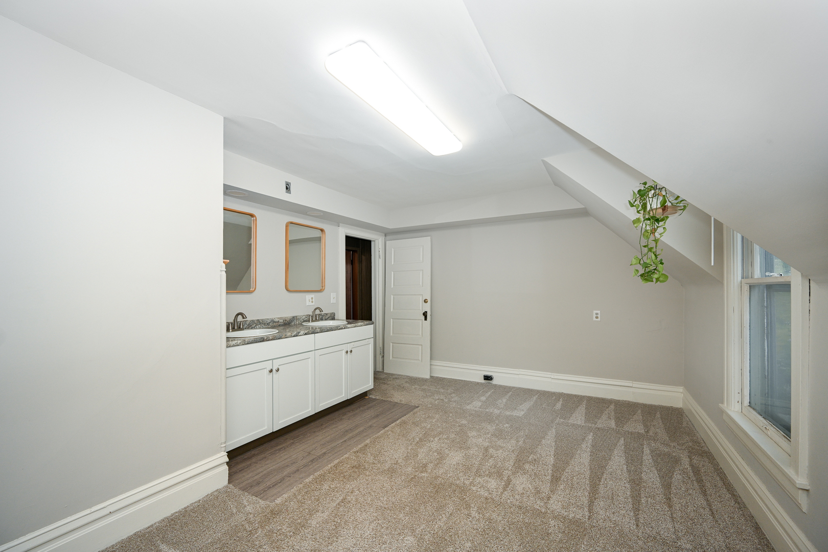 24021 Chicago Street Plainfield, IL 60544 - Photo 25 of 41 a room with a stove and a window