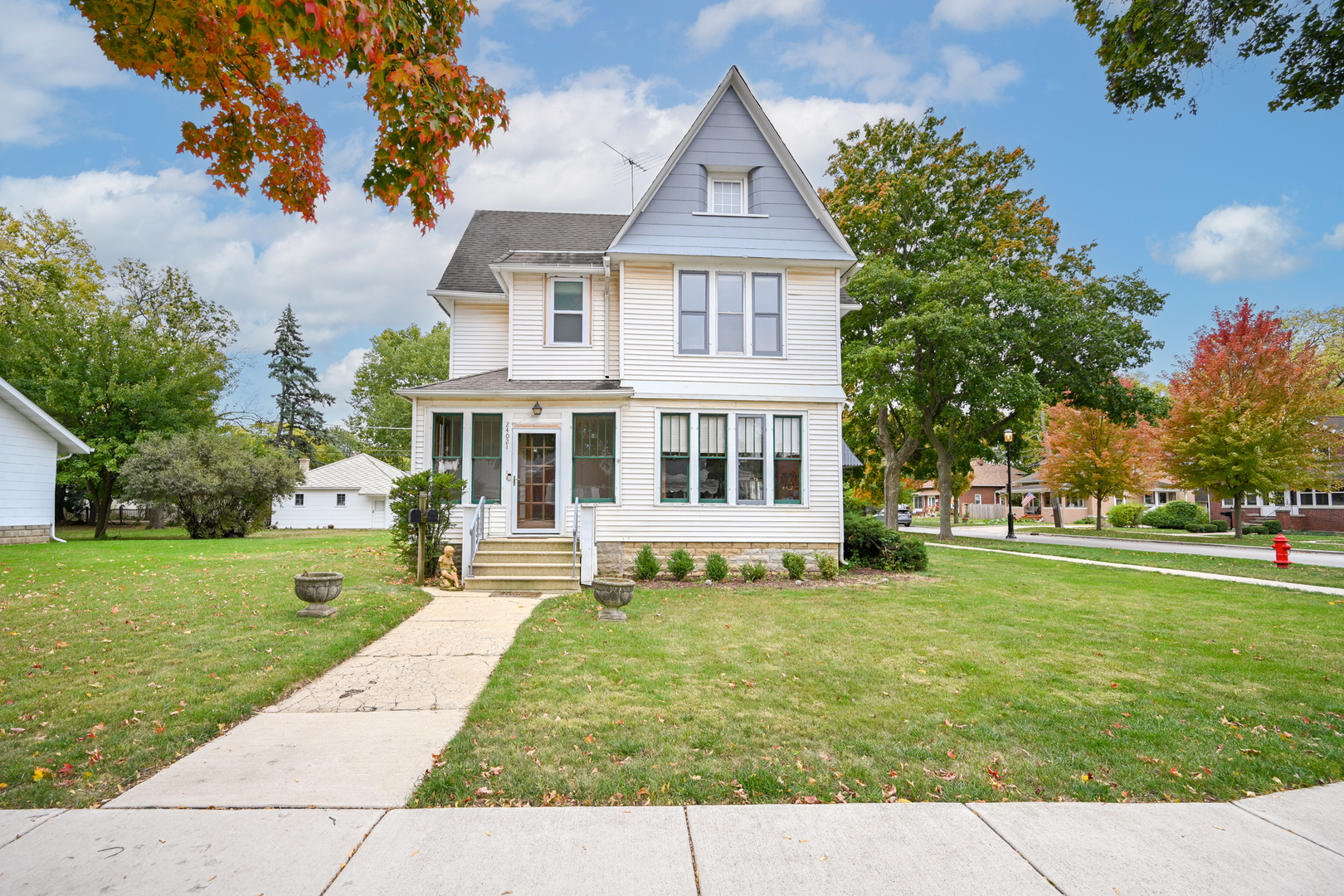 24021 Chicago Street Plainfield, IL 60544 - Photo 3 of 41 a view of a house with a yard