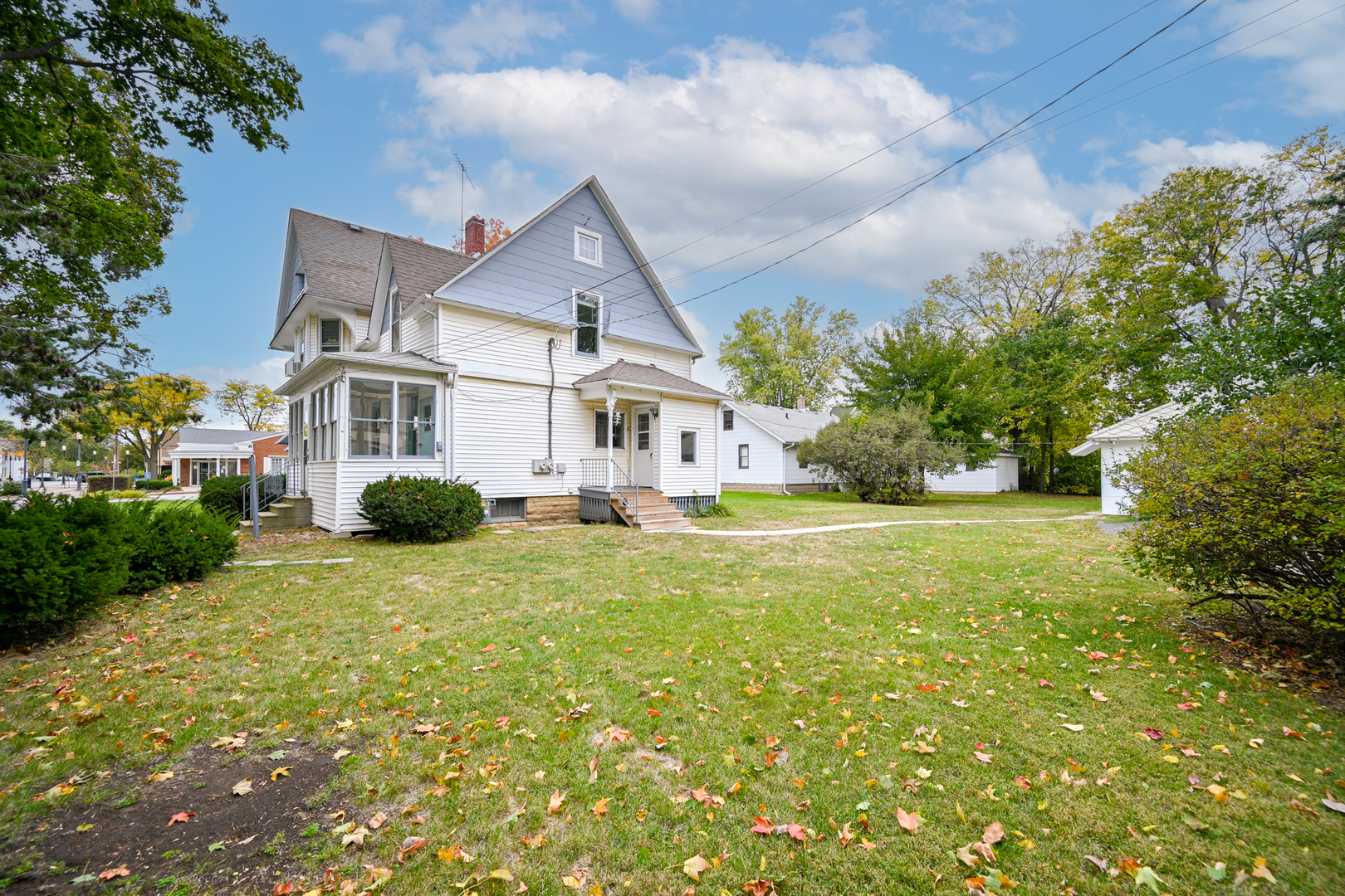 24021 Chicago Street Plainfield, IL 60544 - Photo 4 of 41 a front view of a house with garden