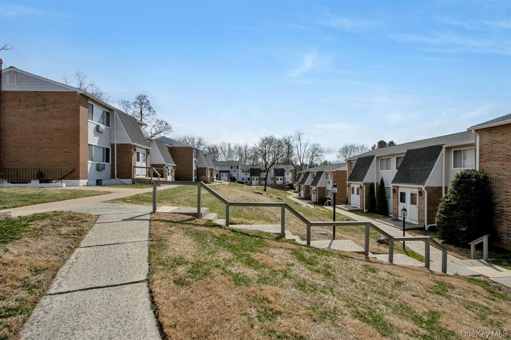 2740 South Road, Unit G11 Poughkeepsie, NY 12601 - Photo 14 of 14 a view of a house with swimming pool