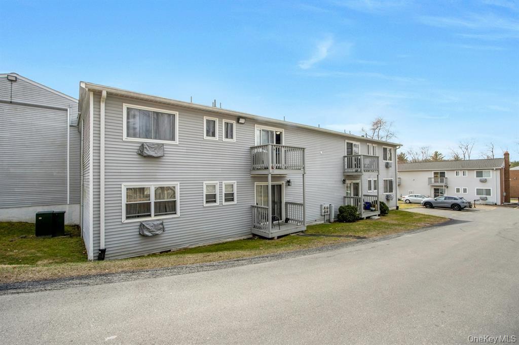 2740 South Road, Unit G11 Poughkeepsie, NY 12601 - Photo 2 of 14 a view of a house with a street