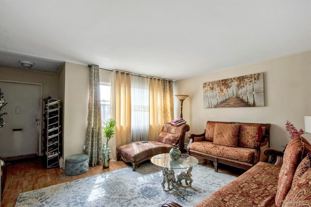 2740 South Road, Unit G11 Poughkeepsie, NY 12601 - Photo 4 of 14 a living room with furniture and a window