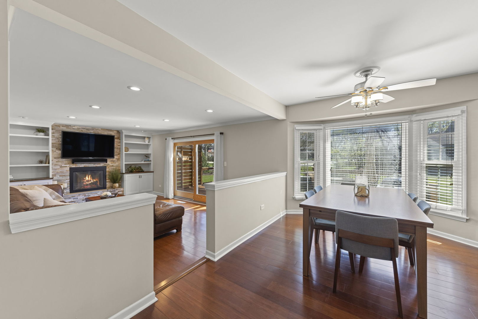 472 Sheffield Road Naperville, IL 60565 - Photo 15 of 47 a view of a dining room with furniture window and wooden floor