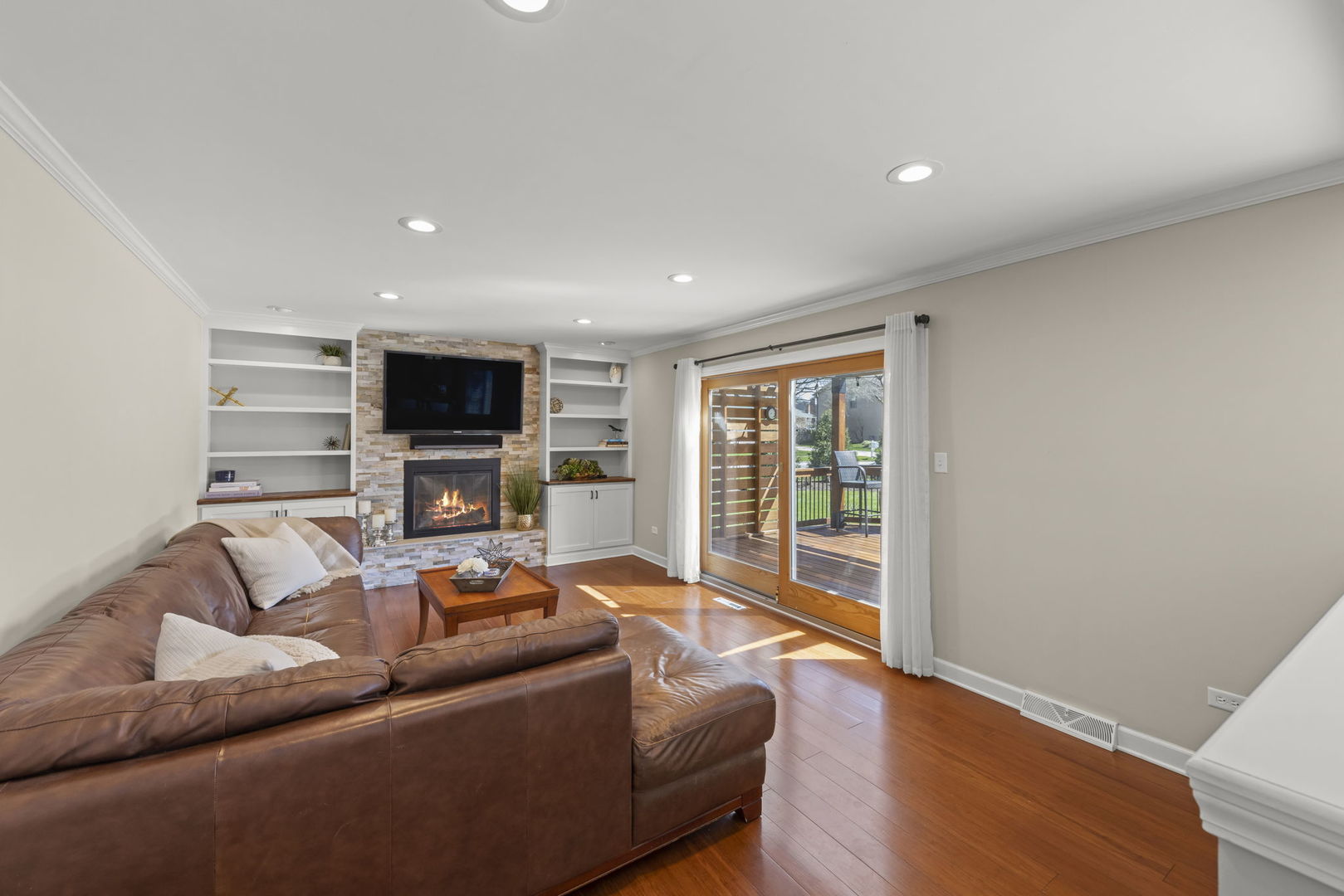 472 Sheffield Road Naperville, IL 60565 - Photo 16 of 47 a living room with furniture and a flat screen tv