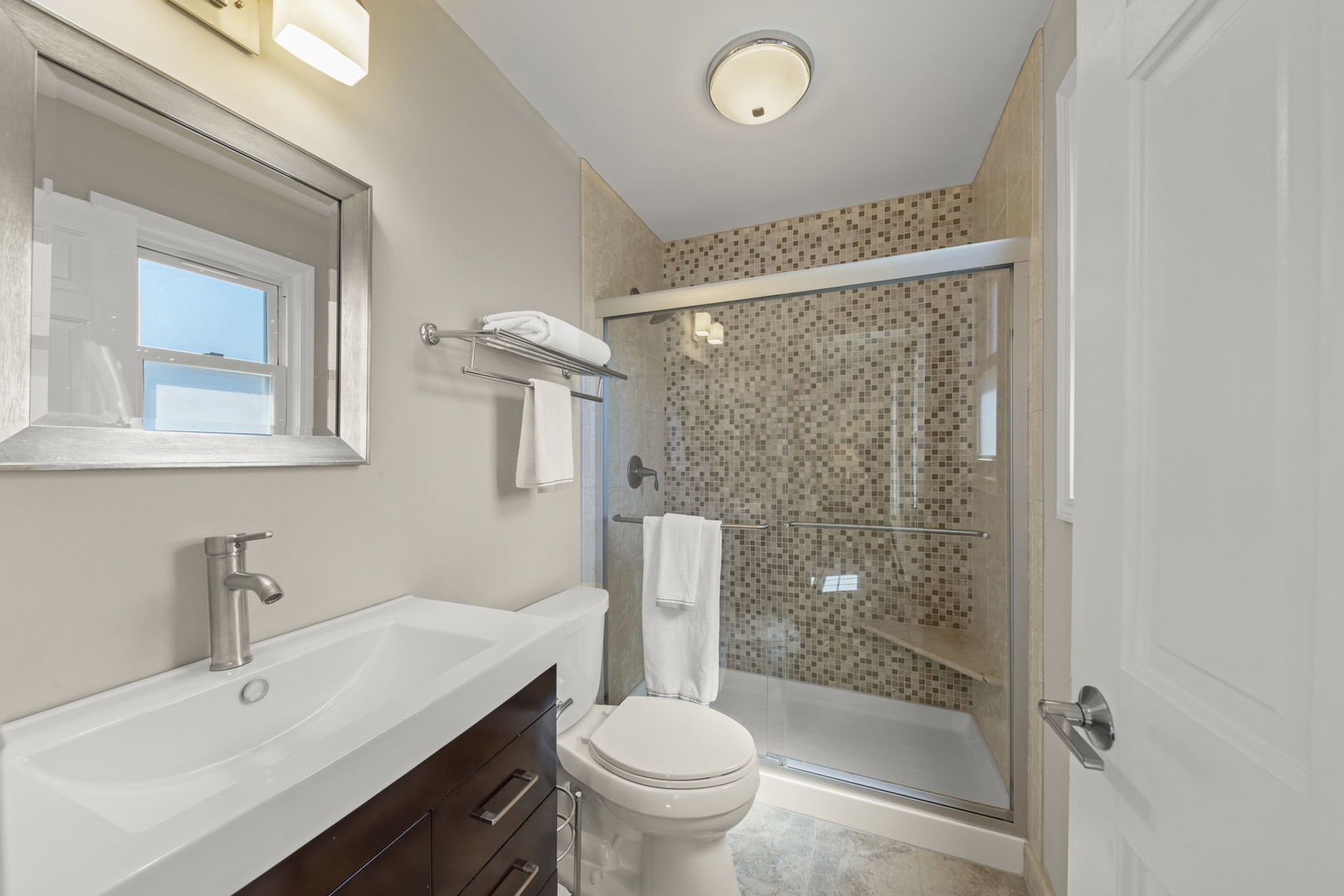 472 Sheffield Road Naperville, IL 60565 - Photo 21 of 47 a bathroom with a sink a toilet and shower