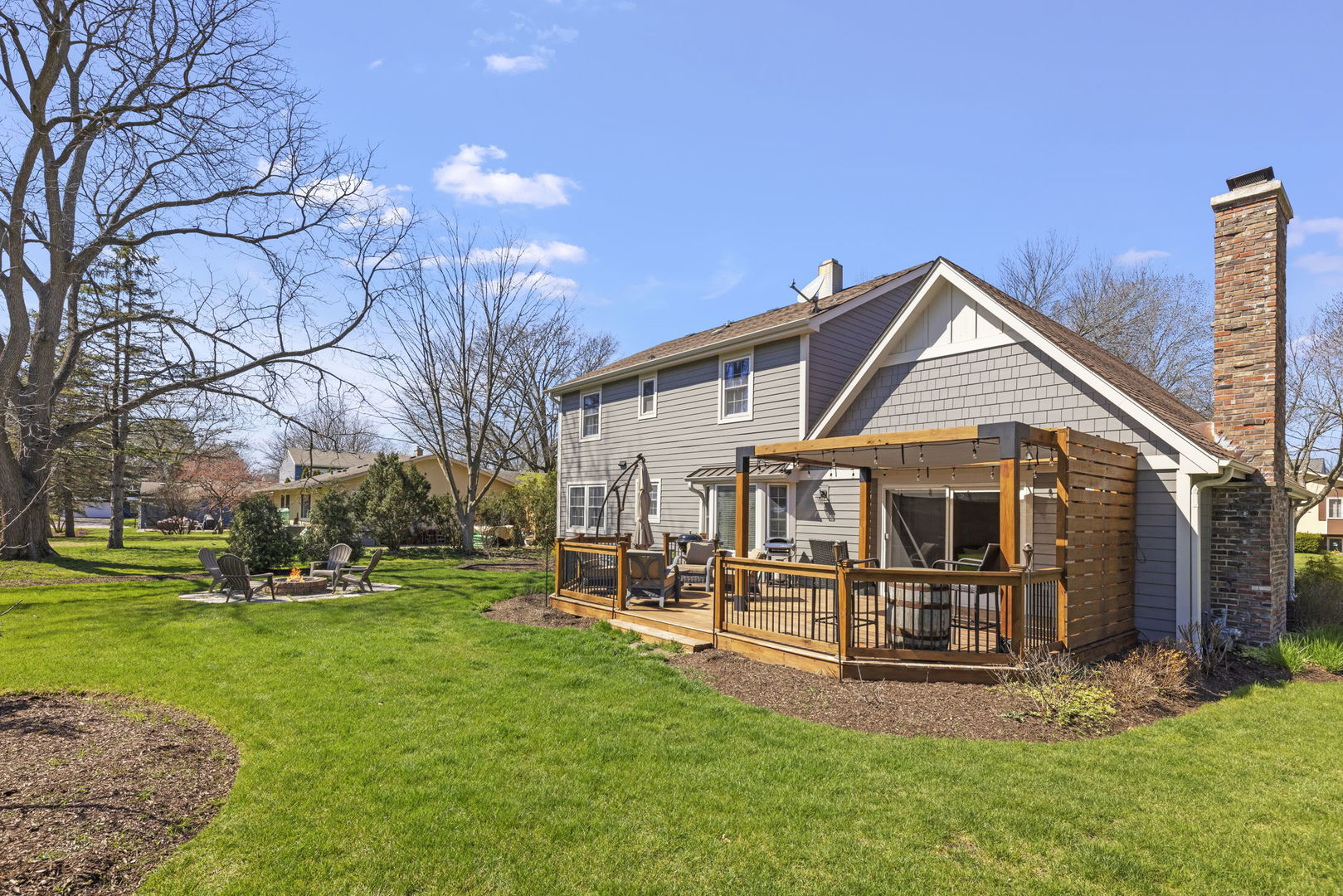 472 Sheffield Road Naperville, IL 60565 - Photo 34 of 47 a view of a house with a yard porch and sitting area