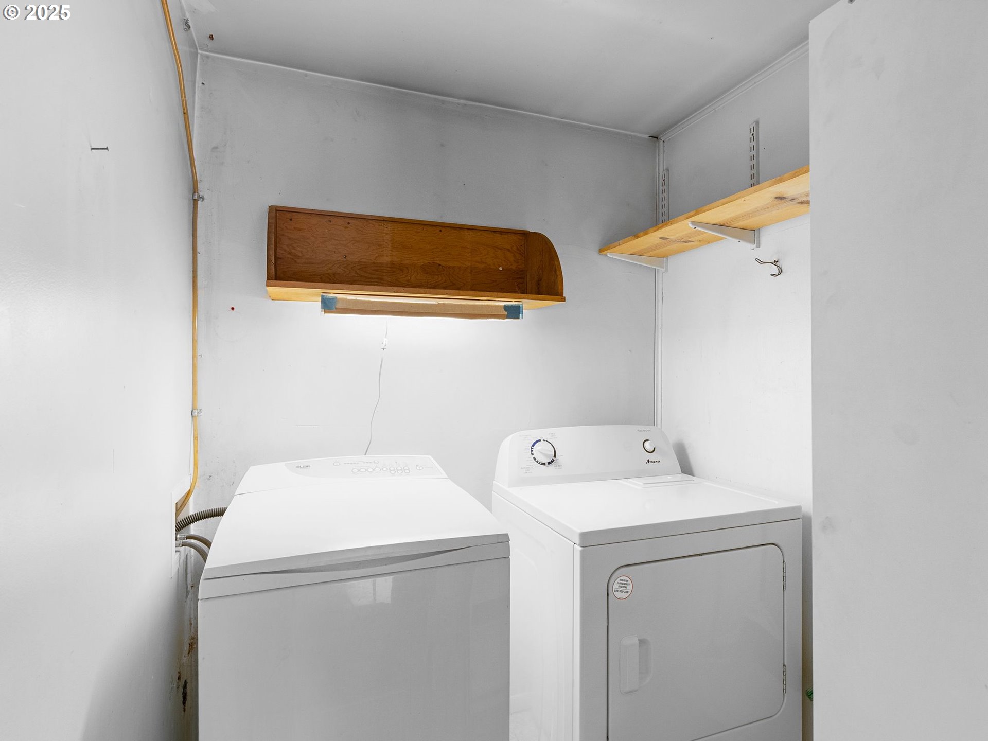 426 Northeast 116th Place Portland, OR 97220 - Photo 27 of 42 a utility room with dryer and washer