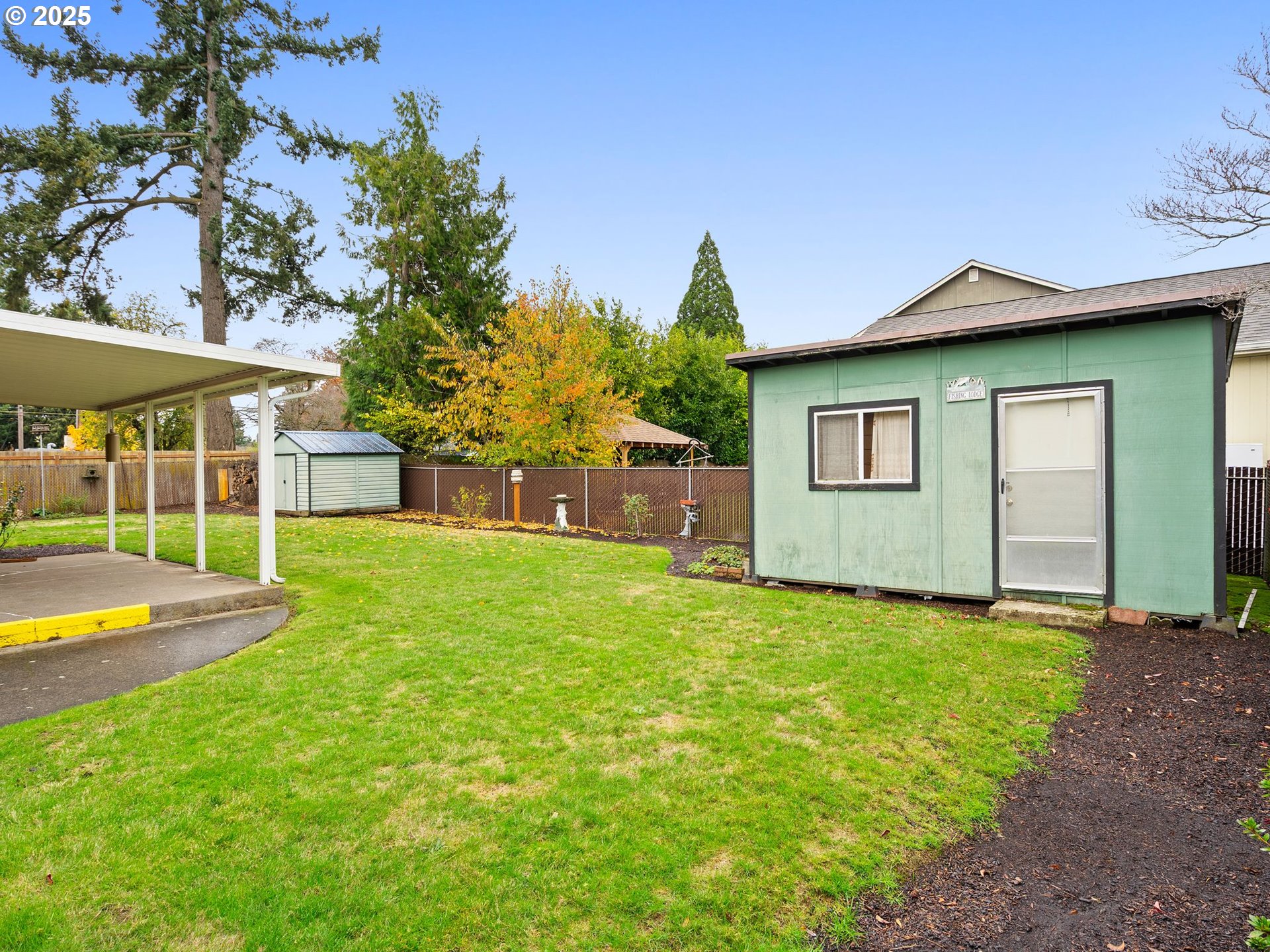 426 Northeast 116th Place Portland, OR 97220 - Photo 30 of 42 a view of a house with backyard and sitting area