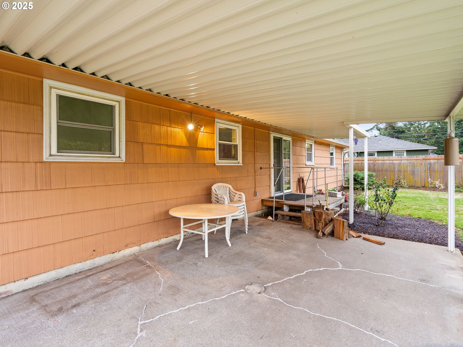 426 Northeast 116th Place Portland, OR 97220 - Photo 38 of 42 a backyard of a house with outdoor seating