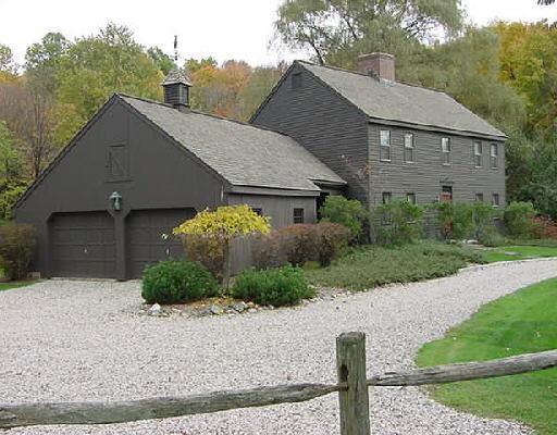396 North Street Ridgefield, CT 06877 - Photo 1 of 1 a front view of a house with a yard and garage