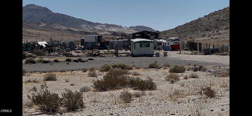 a view of a road with a building in the background