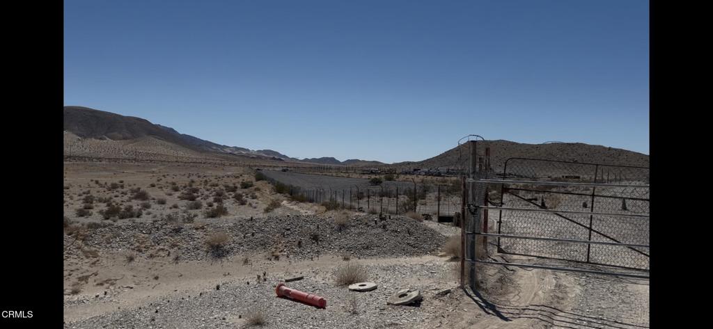 45101 Afton Road Baker, CA 92309 - Photo 23 of 38 a view of a house with a mountain
