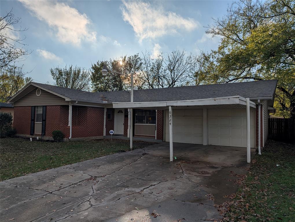 6324 Regal Road Forest Hill, TX 76119 - Photo 3 of 24 Ranch-style home featuring driveway, a garage, brick siding, and roof with shingles