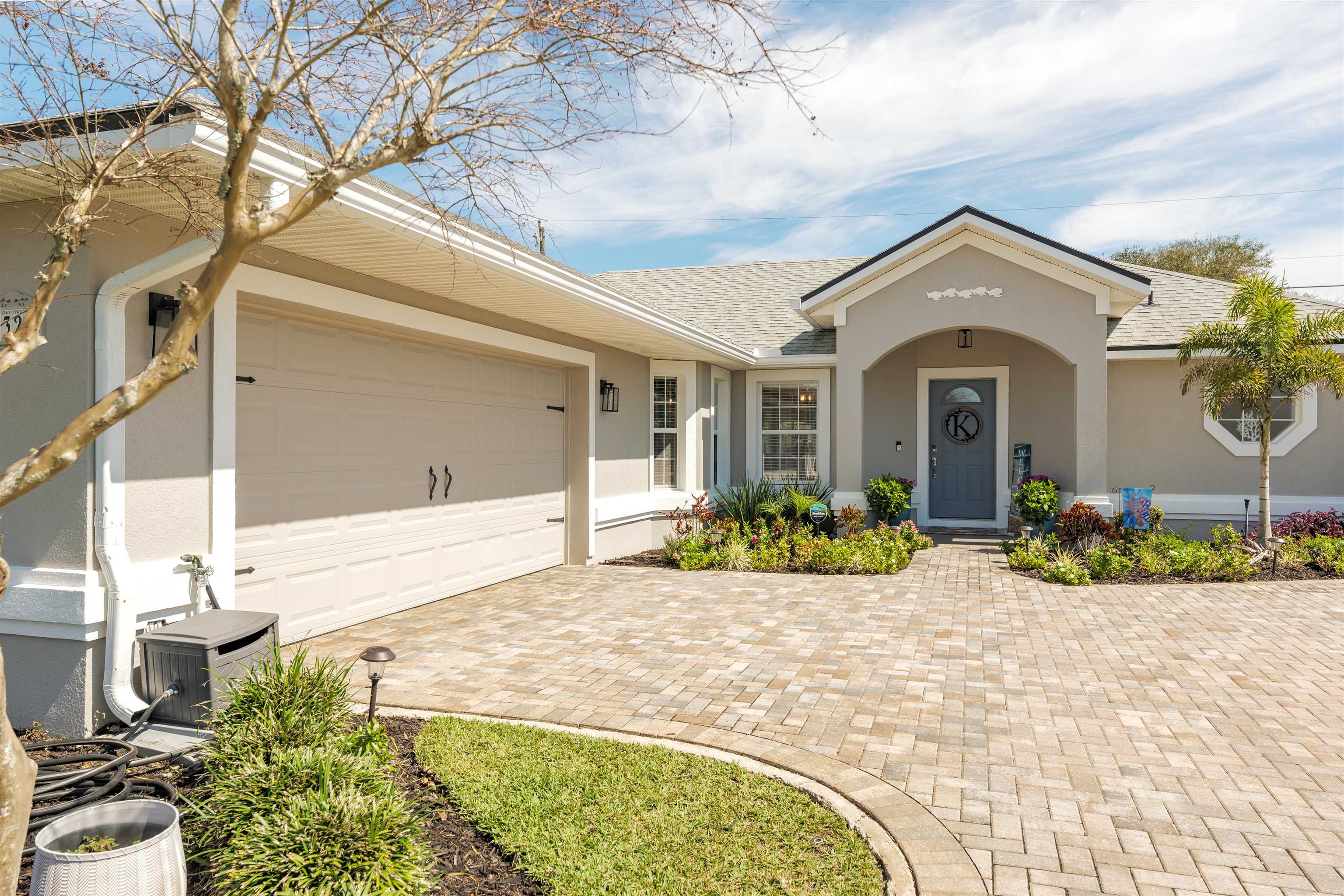 5324 5th Street St. Augustine, FL 32080 - Photo 1 of 45 a front view of a house with garden