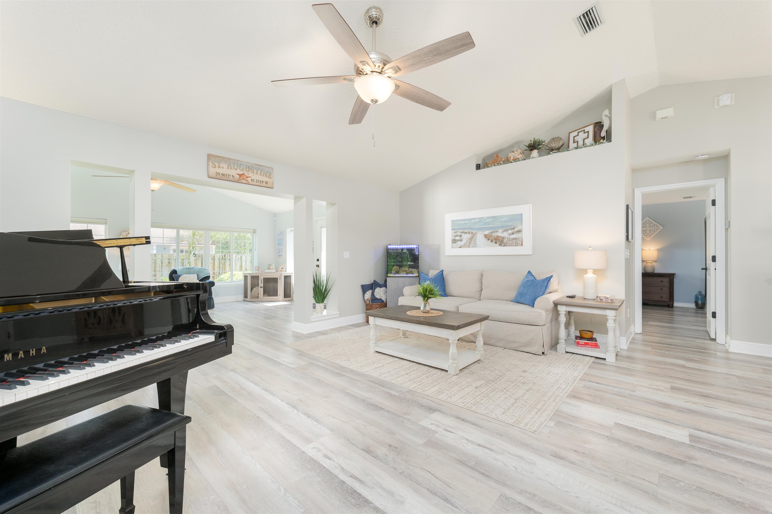 5324 5th Street St. Augustine, FL 32080 - Photo 37 of 45 a living room with furniture and a wooden floor