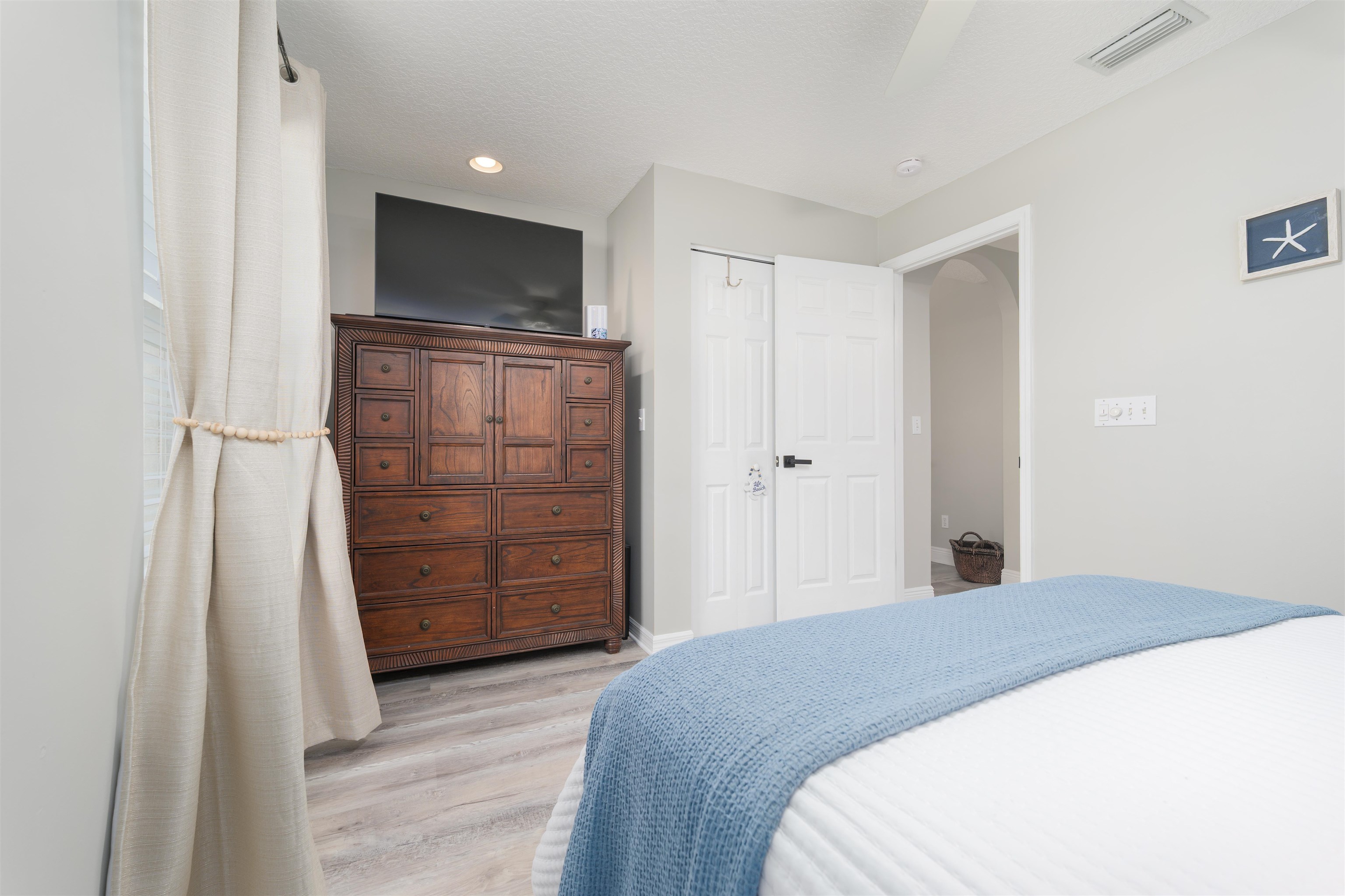 5324 5th Street St. Augustine, FL 32080 - Photo 40 of 45 a bedroom with a bed and a bathroom