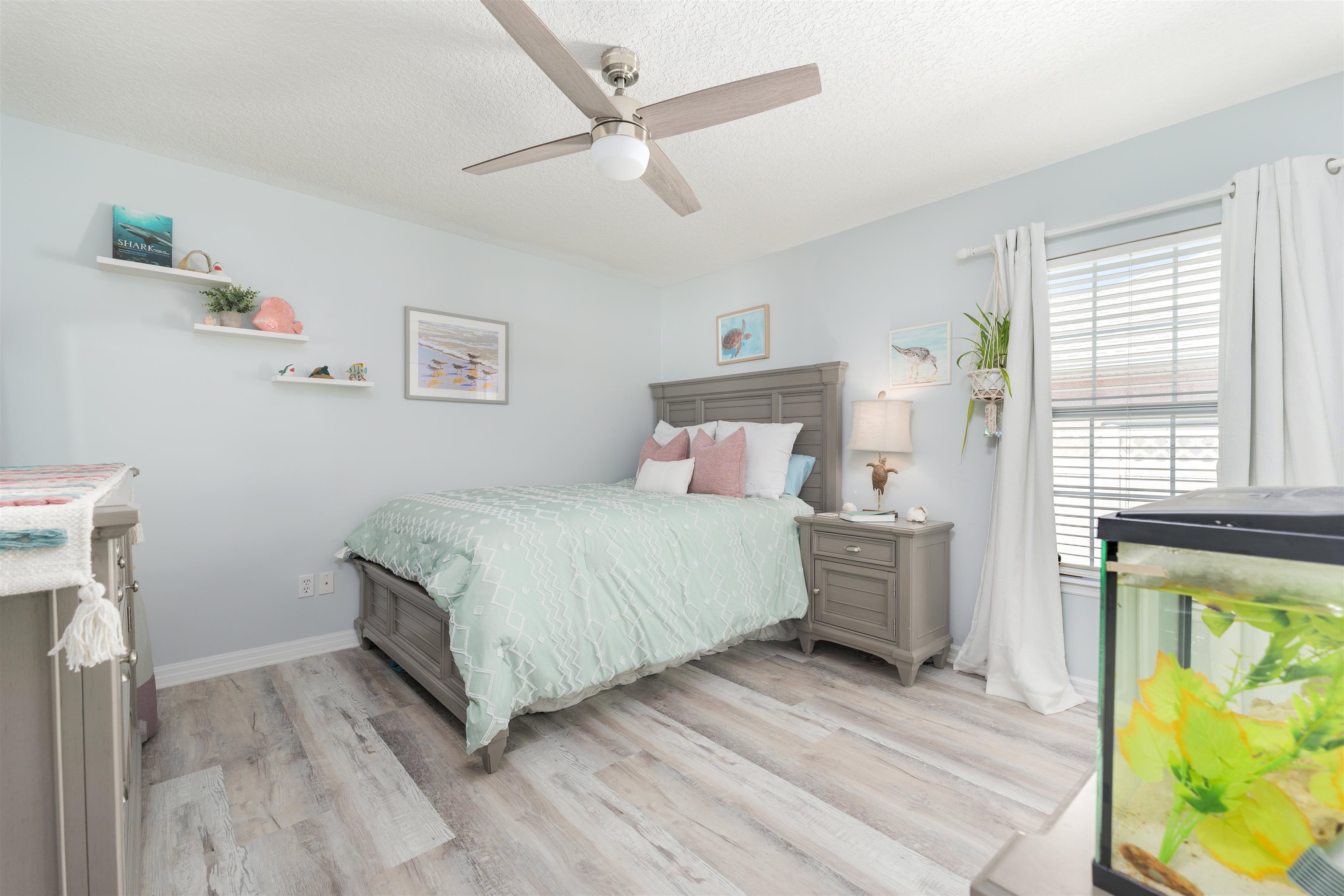 5324 5th Street St. Augustine, FL 32080 - Photo 42 of 45 a bedroom with a bed and a window