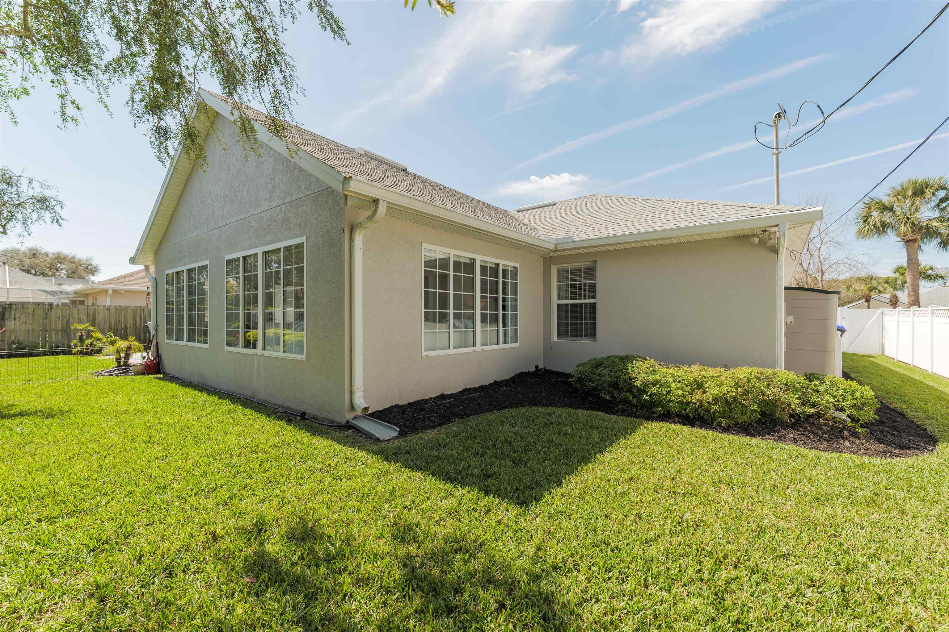 5324 5th Street St. Augustine, FL 32080 - Photo 9 of 45 a view of an house with backyard and garden