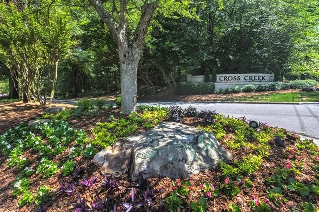 a view of a street with a bench