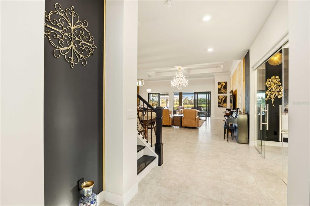 13349 Verandi Street Venice, FL 34293 - Photo 12 of 76 a view of a livingroom with gym equipment