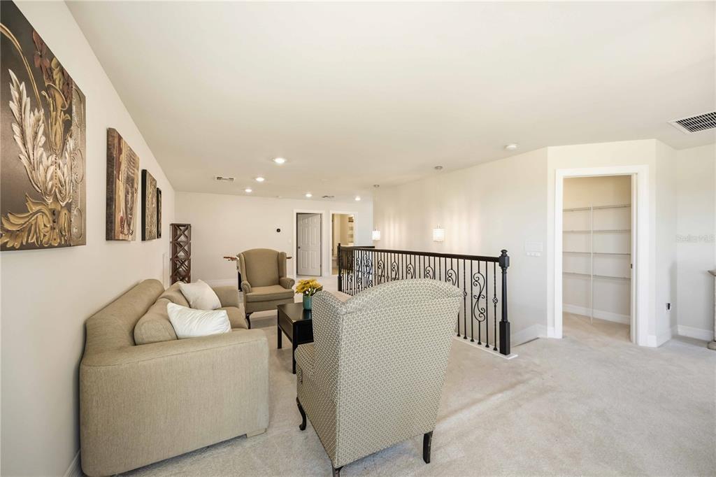 13349 Verandi Street Venice, FL 34293 - Photo 29 of 76 a view of a livingroom with furniture and windows