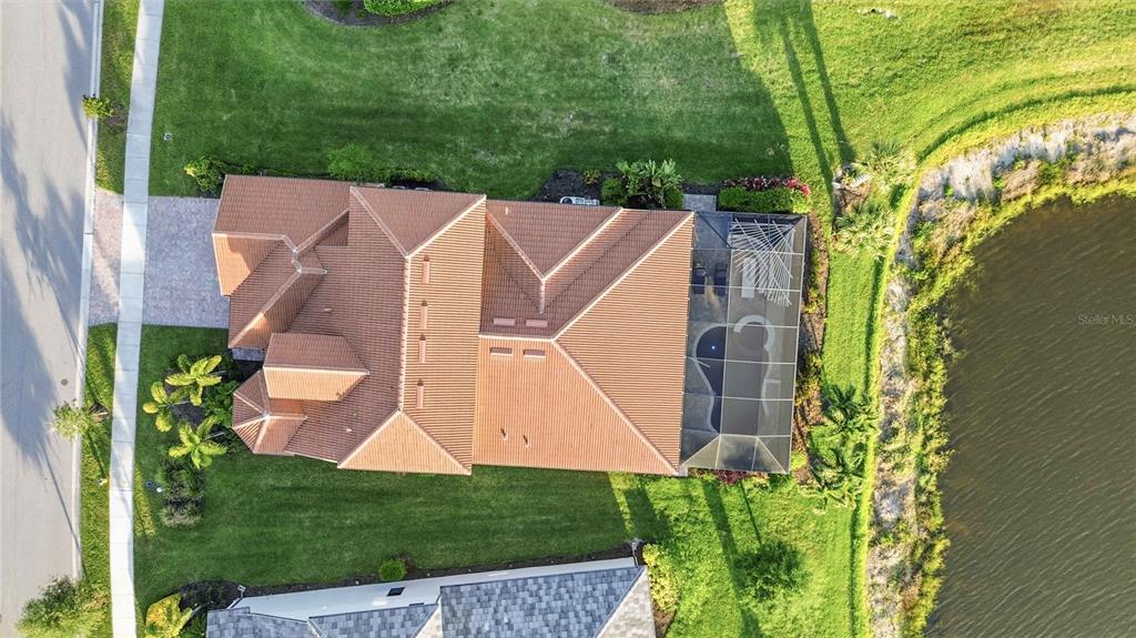 13349 Verandi Street Venice, FL 34293 - Photo 53 of 76 a view of a house with a yard