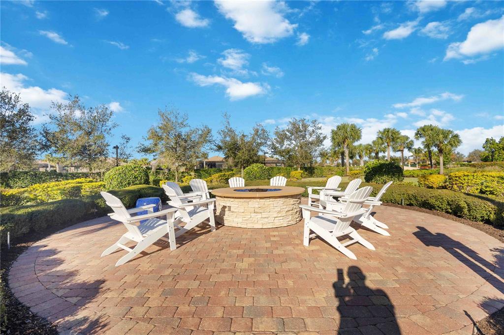 13349 Verandi Street Venice, FL 34293 - Photo 69 of 76 a view of a terrace with furniture and garden