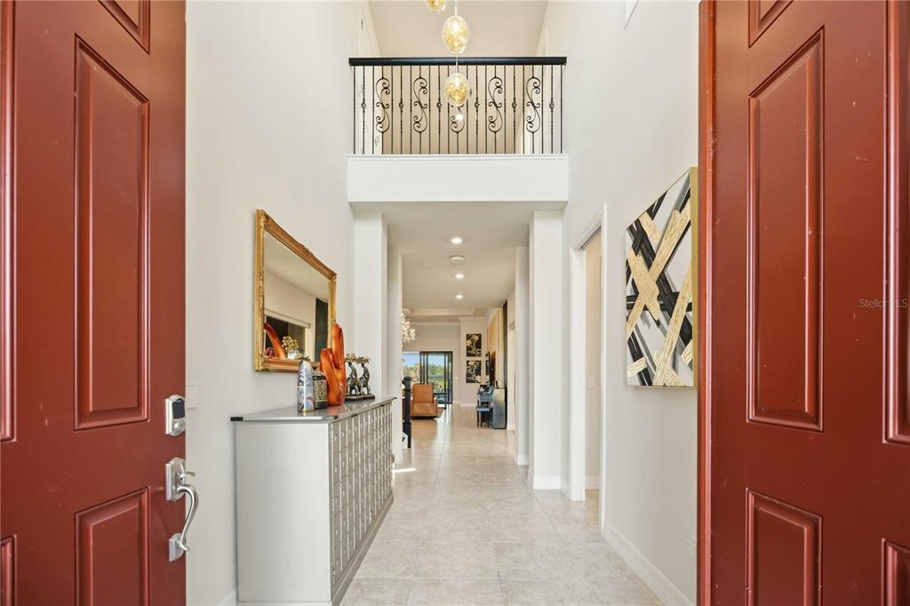 13349 Verandi Street Venice, FL 34293 - Photo 10 of 76 a view of a hallway with furniture and entryway