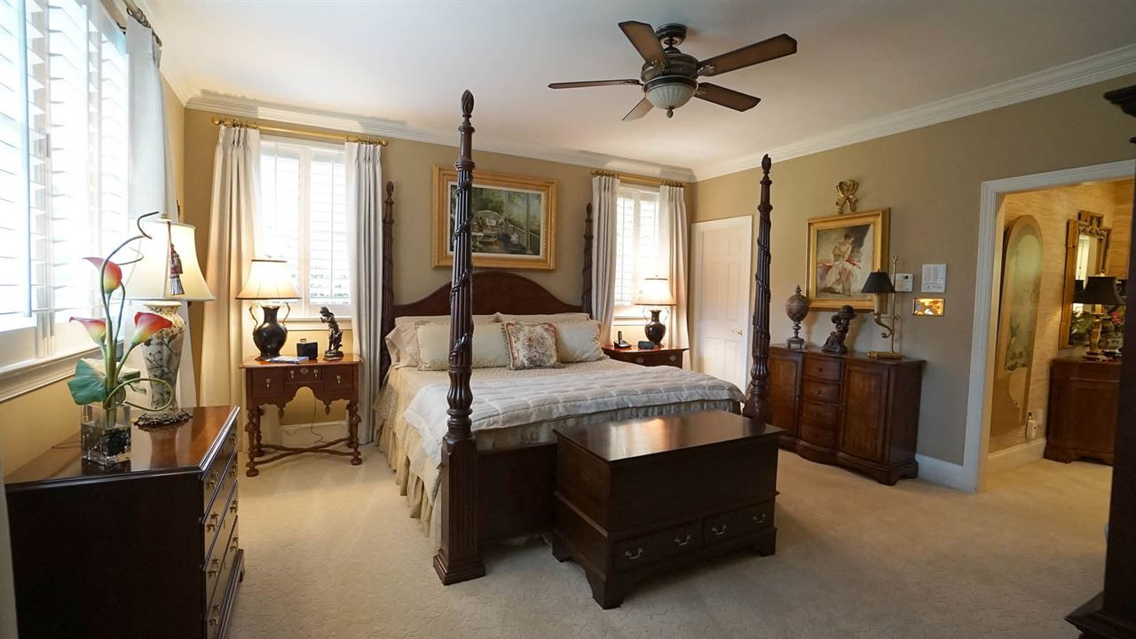 1900 Torrington Street Raleigh, NC 27615 - Photo 11 of 30 Main level over sized master bedroom-tons of light, which is a theme throughout the home. Karastan carpet installed in 2016. Master Bedroom