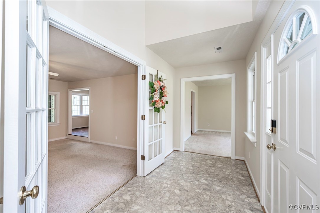 13819 Bluff Ridge Drive Chesterfield, VA 23838 - Photo 11 of 45 Foyer leading to Family Room and Formal Dining Roo