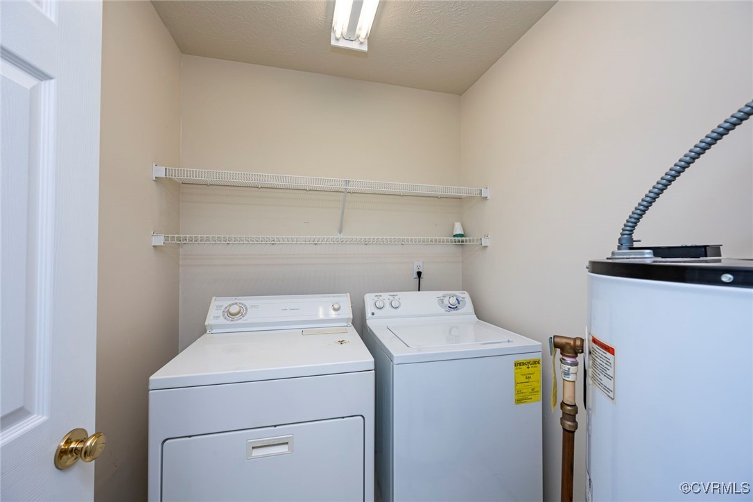 13819 Bluff Ridge Drive Chesterfield, VA 23838 - Photo 26 of 45 Laundry room featuring washer, dryer and hot water