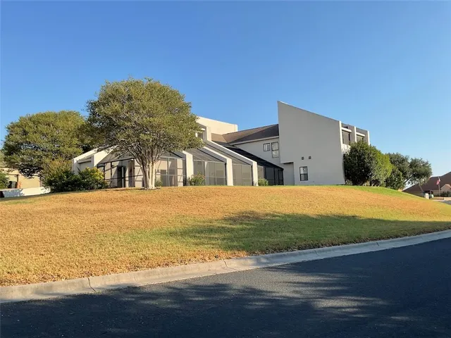 a front view of house with ocean view