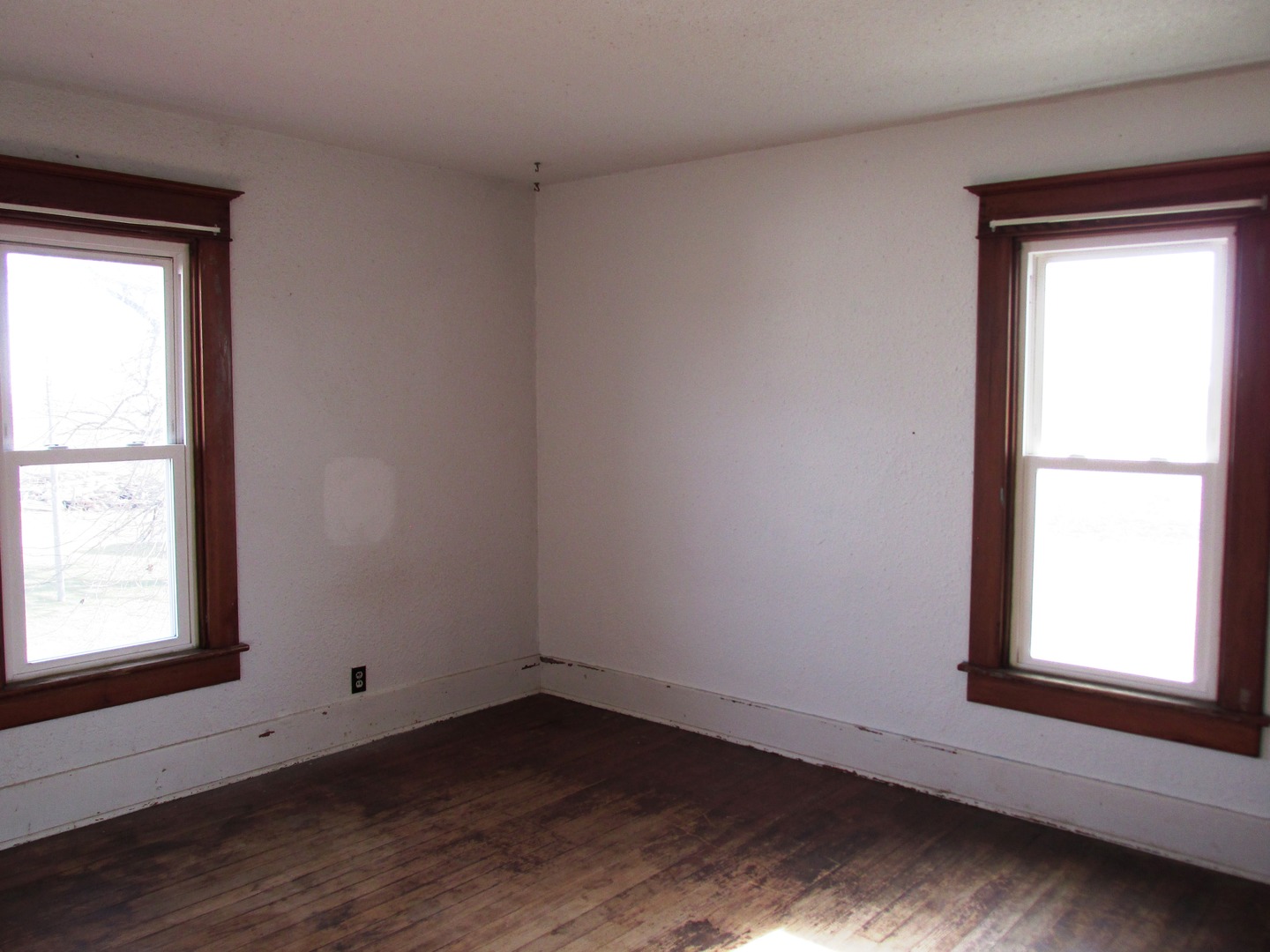 3850 Bishop Road Prophetstown, IL 61277 - Photo 14 of 32 an empty room with wooden floor and windows