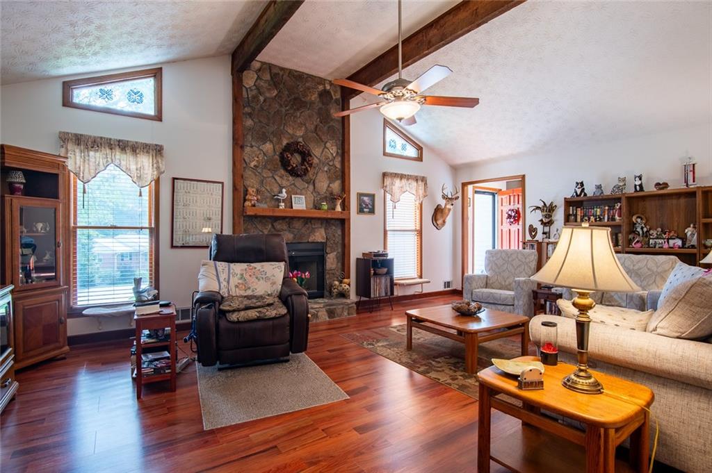 2966 Riviera Drive Conyers, GA 30012 - Photo 13 of 63 a living room with furniture and a fireplace