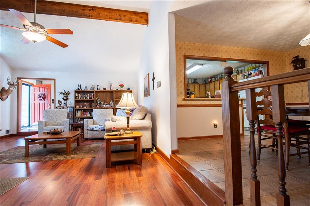 2966 Riviera Drive Conyers, GA 30012 - Photo 15 of 63 a living room with furniture and wooden floor