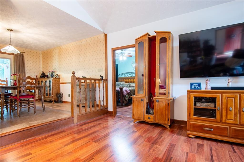 2966 Riviera Drive Conyers, GA 30012 - Photo 16 of 63 a view of a livingroom with furniture and a flat screen tv
