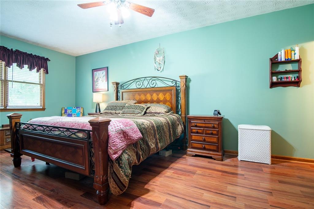 2966 Riviera Drive Conyers, GA 30012 - Photo 17 of 63 a bedroom with a bed and a window