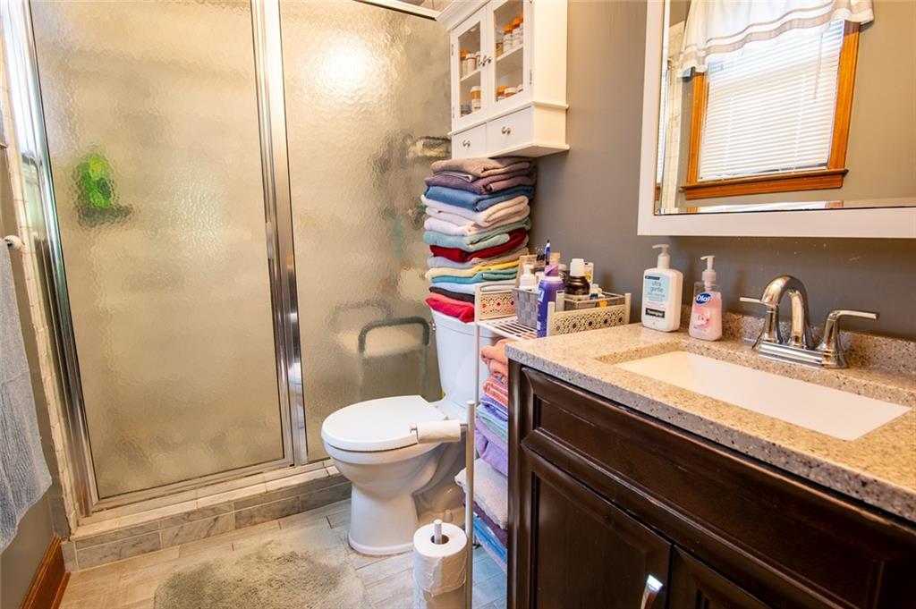 2966 Riviera Drive Conyers, GA 30012 - Photo 20 of 63 a bathroom with a sink and a toilet